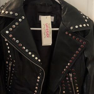 Brand new leather jacket with studs and embroidery.